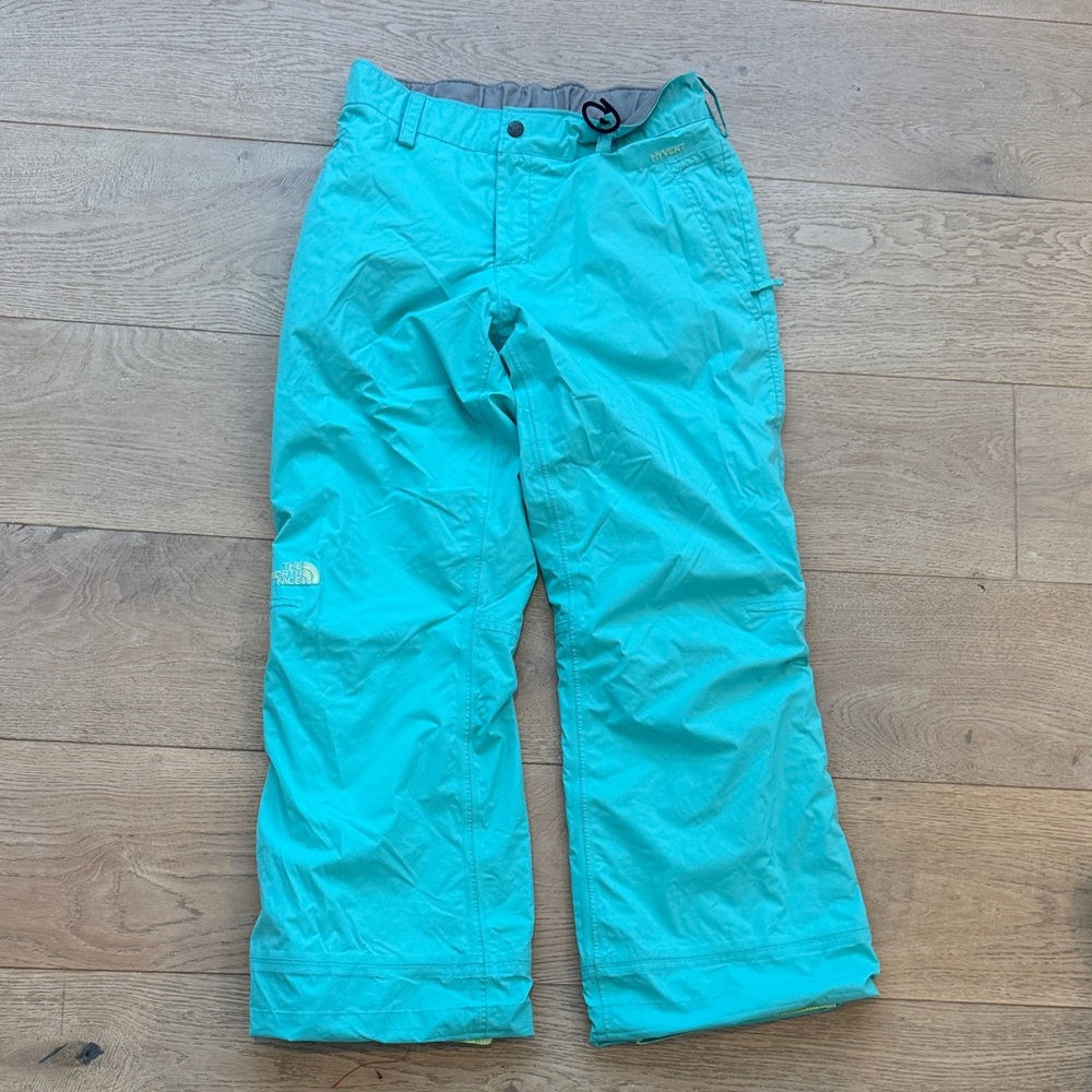 Kid’s Turquoise North Face waterproof Snow Pants. Size 14/16(large).